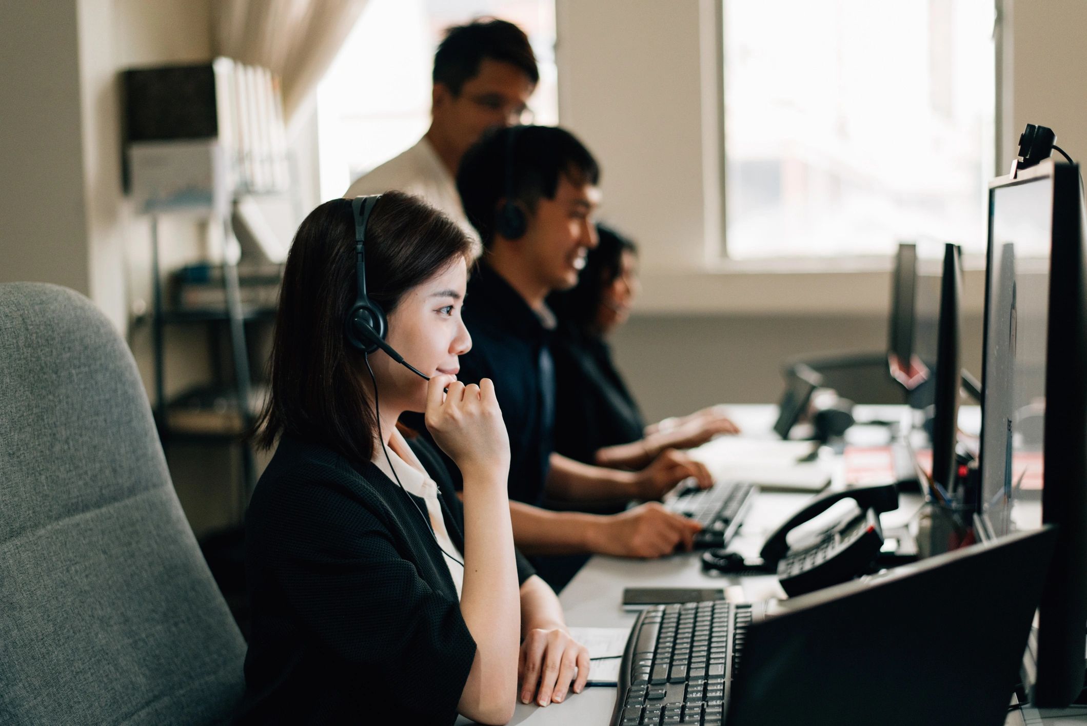 Customer support professional wearing a headset