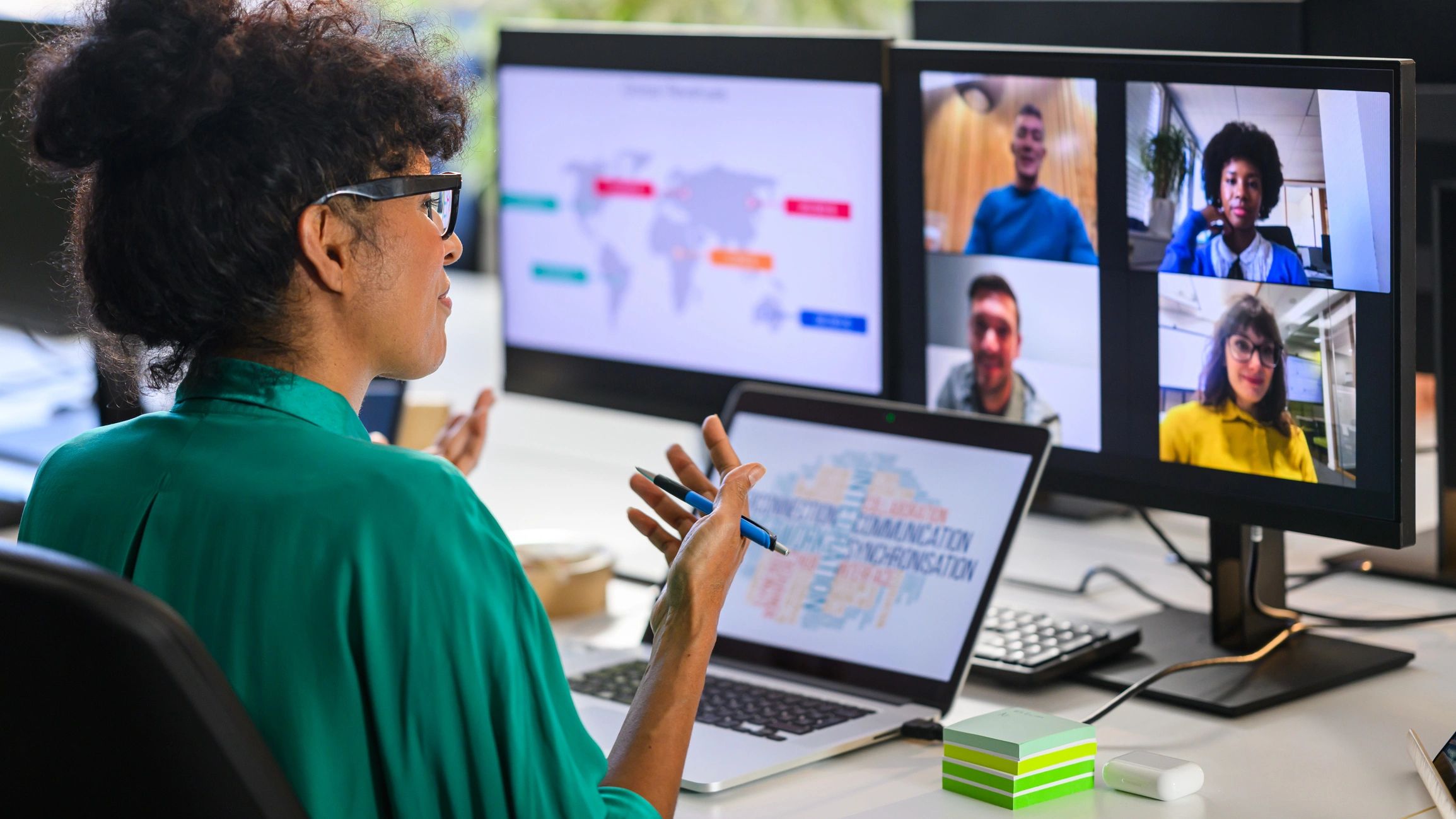 Business analyst discussing reports with remote workers
