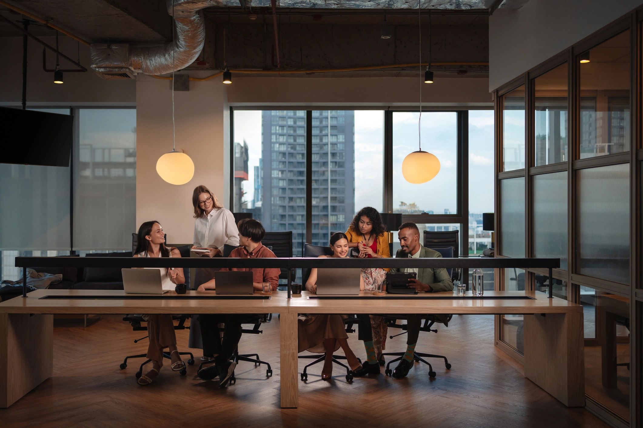 Team members collaborating in a modern workspace